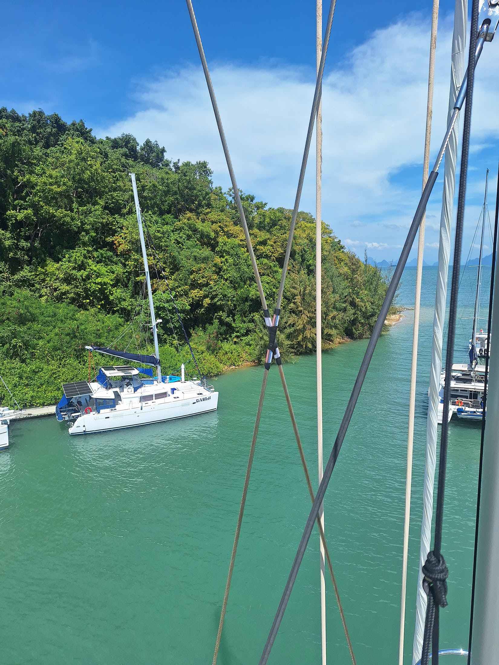 View of Ao Por Marina Phuket from the top of a yacht mast