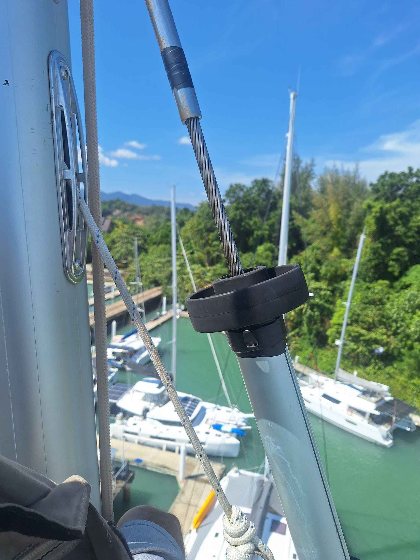 View of Ao Por Marina Phuket from the top of a yacht mast